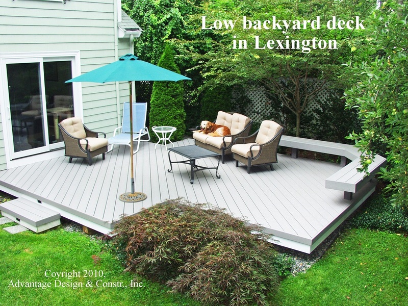 Outdoor deck with patio furniture and golden retriever on couch